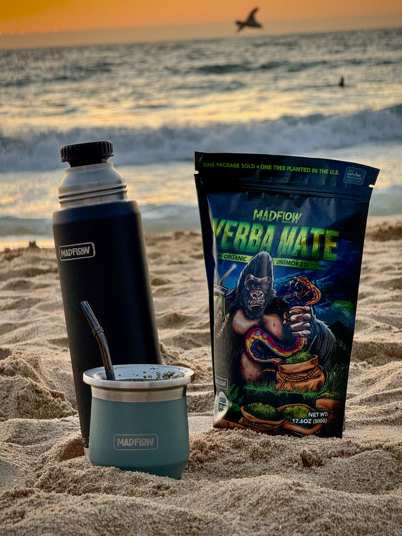 MADFLOW thermos, mate cup and loose leaf yerba mate on the beach