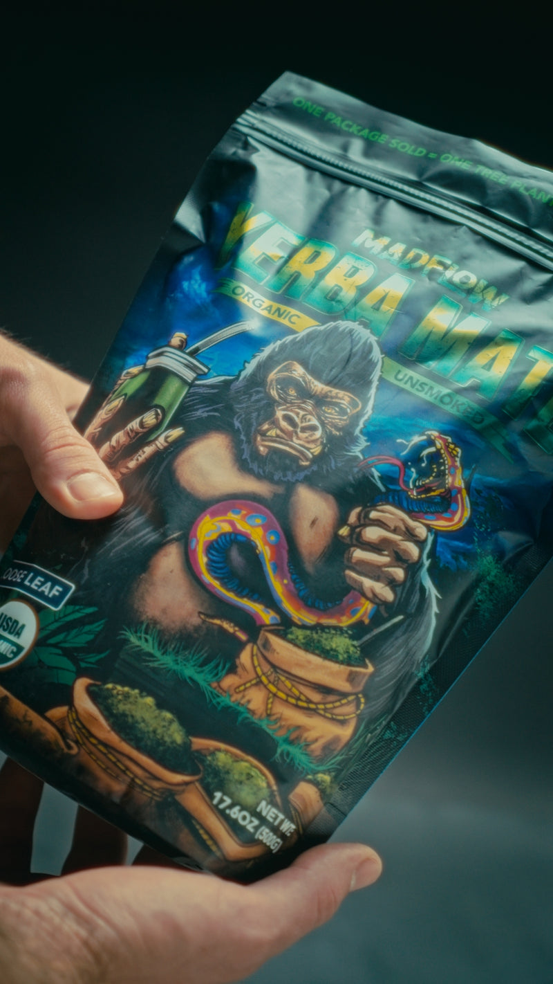 Hands holding the MADFLOW loose leaf yerba mate bag