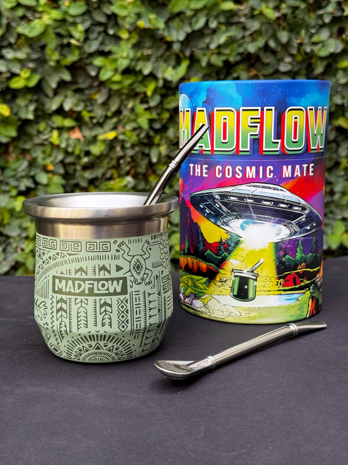 MADFLOW Aztec Green mate cup with bombilla next to the Cosmic Mate gift tube