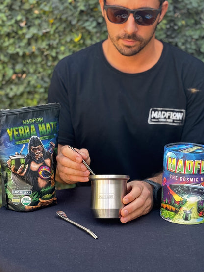 MADFLOW founder preparing yerba mate in the Polished Steel mate cup