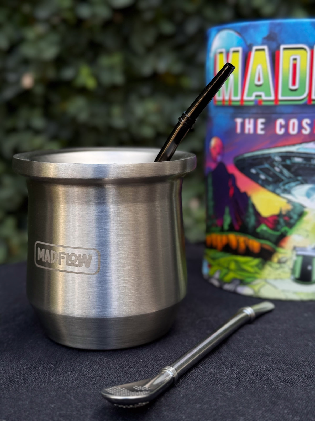 MADFLOW Polished Steel mate cup with bombilla next to the Cosmic Mate gift tube